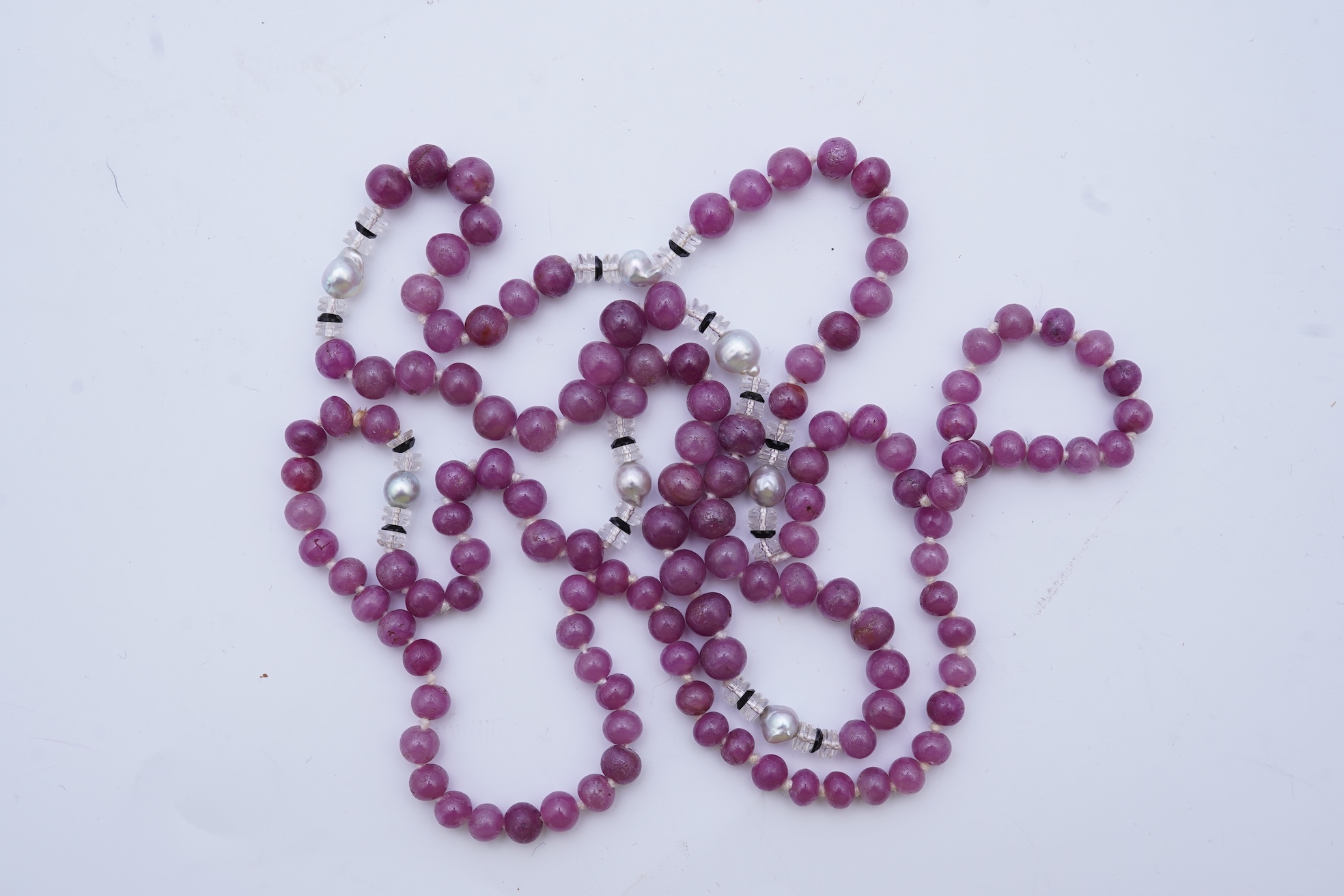 A ruby bead, onyx, rock crystal and pearl necklace
